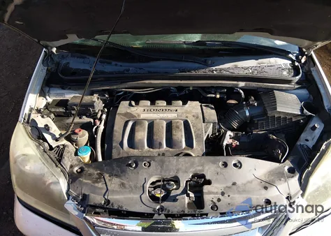 2007 Honda Odyssey Ex-L z USA, uszkodzony, nr VIN 5FNRL38727B062299